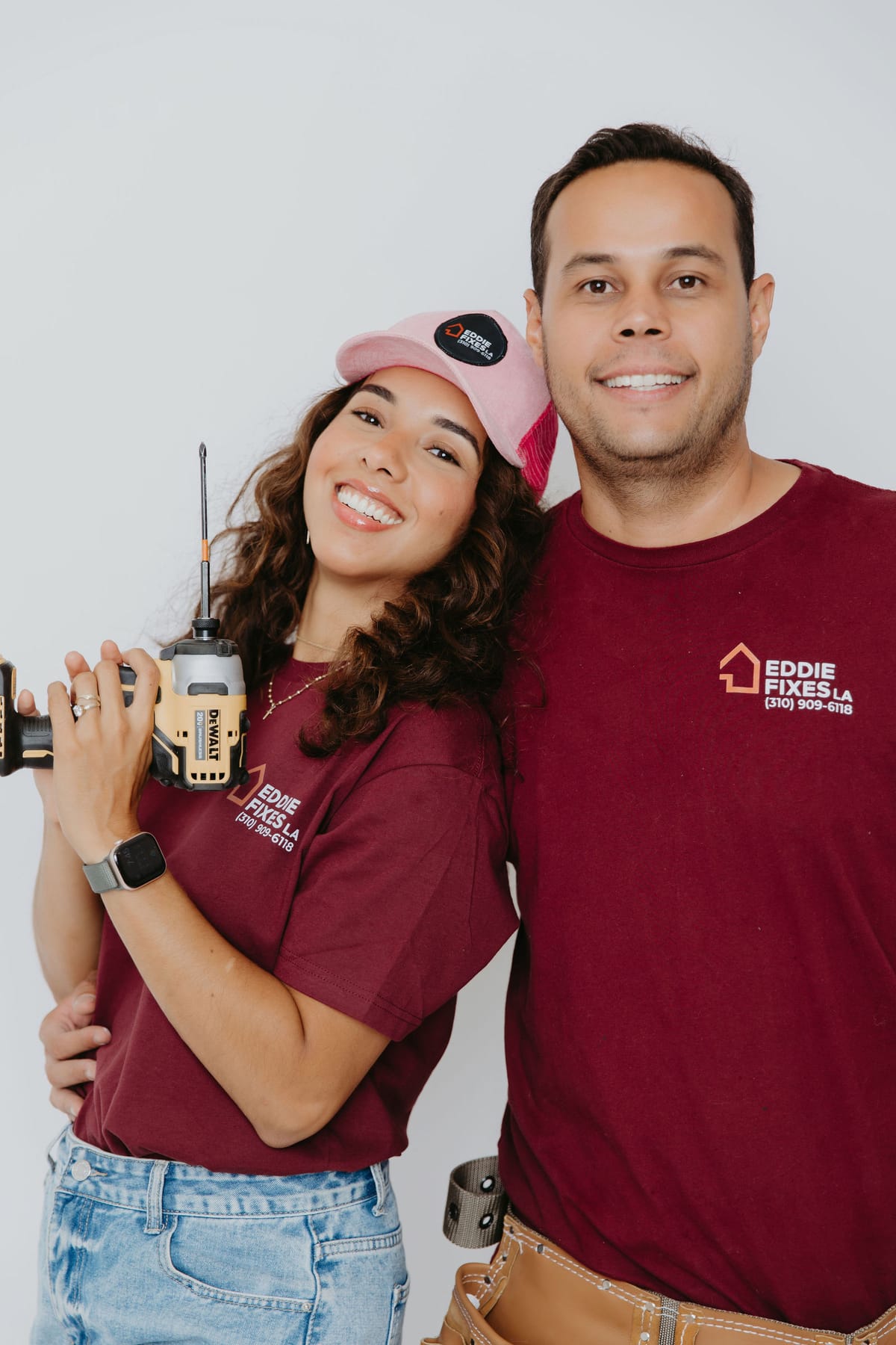 Eddie and Giselle, the family behind Eddie Fixes LA, in company shirts