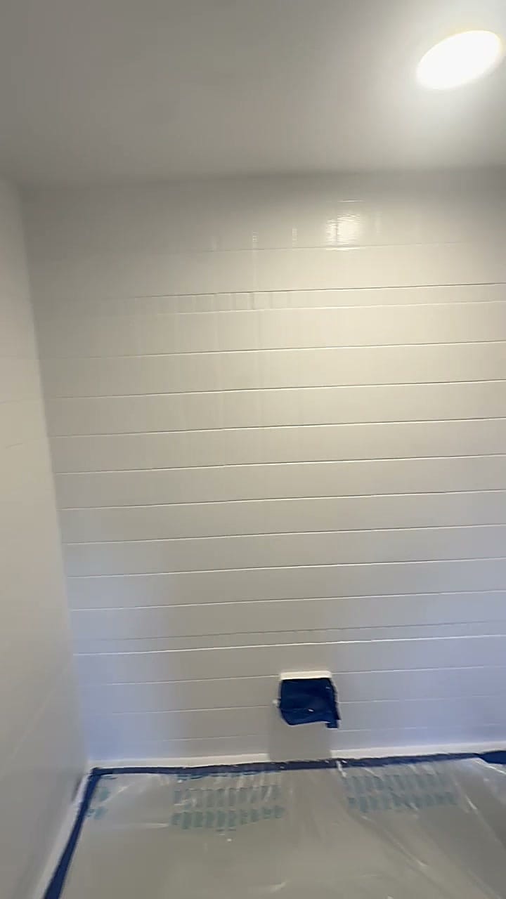 Bathroom shower tile repainted to a fresh white finish in Hollywood, CA 90028