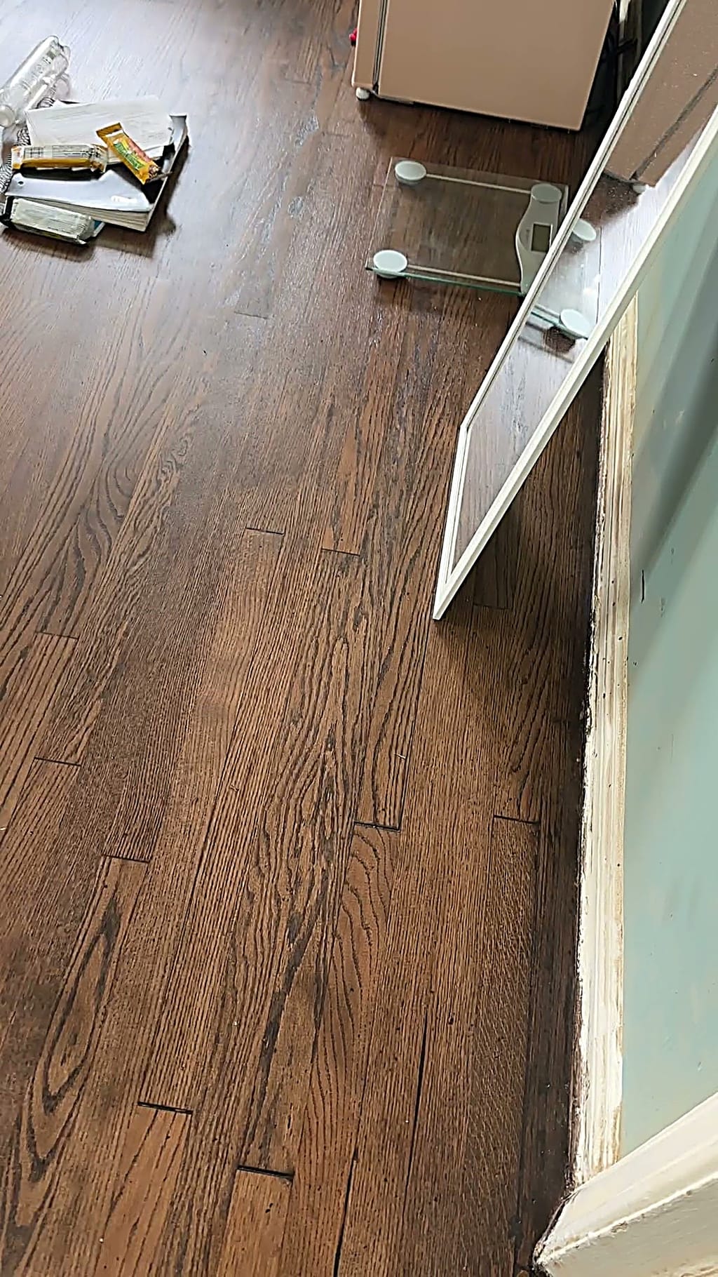 Hardwood floor refinished in a deep, dark stain in Beverlywood, CA 90035