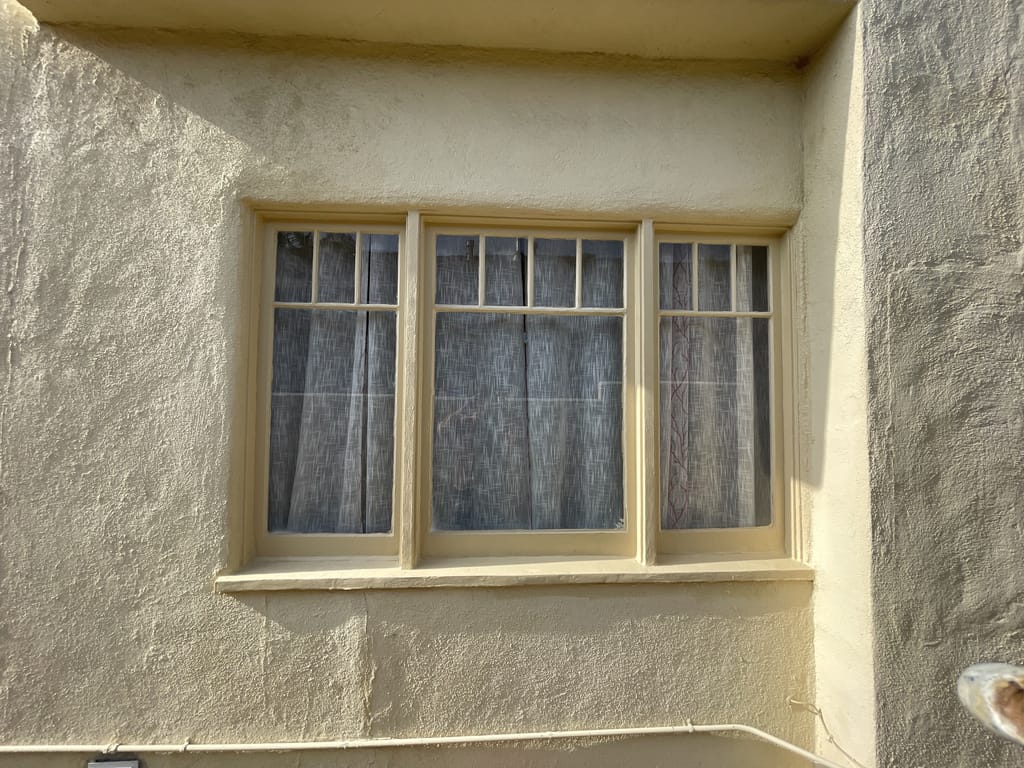 Larger window wood recovered and refinished in Mid-City, CA 90036