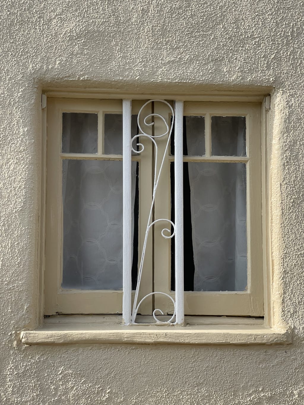 Small window sill rebuilt and repainted to a clean cream finish in Mid-City, CA 90036