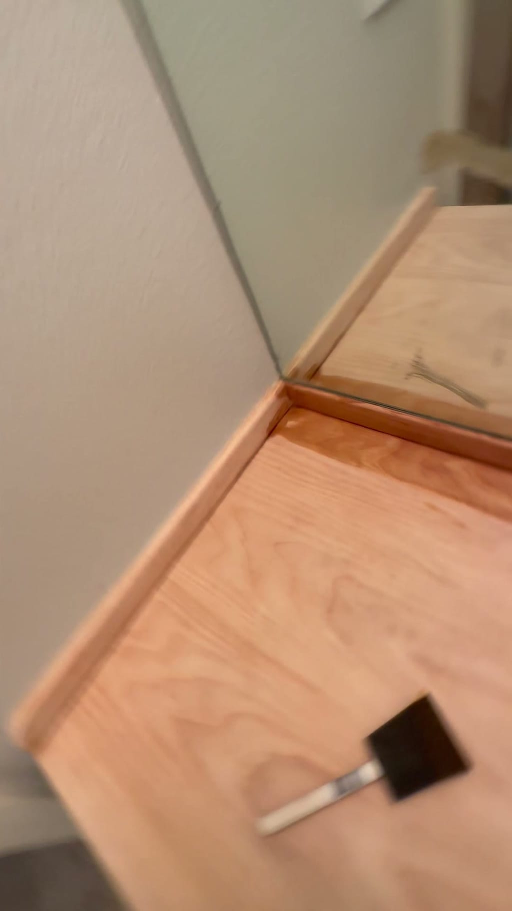 Applying a custom stain to a wood countertop in Brentwood, CA 90049