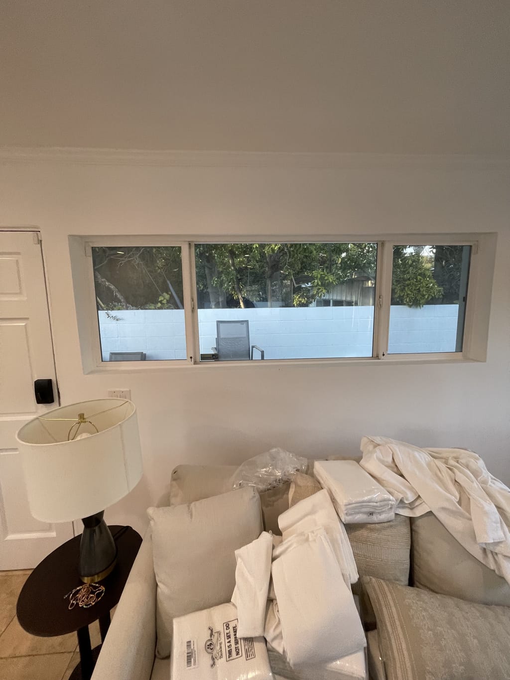 Living area window bare before curtain installation in Bel Air, CA 90077