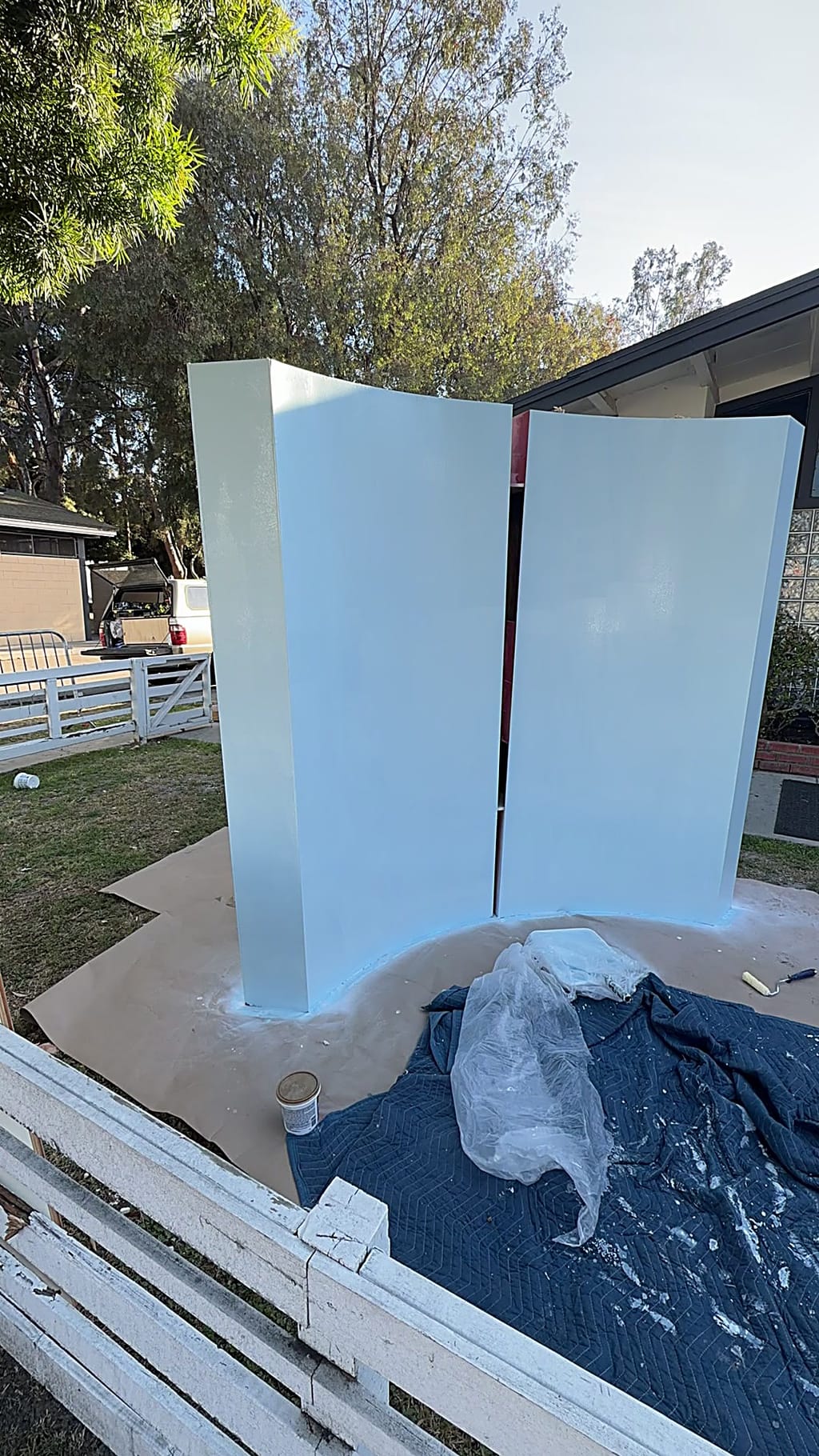 Curved church photo booth repainted a fresh blue in Culver City, CA 90232
