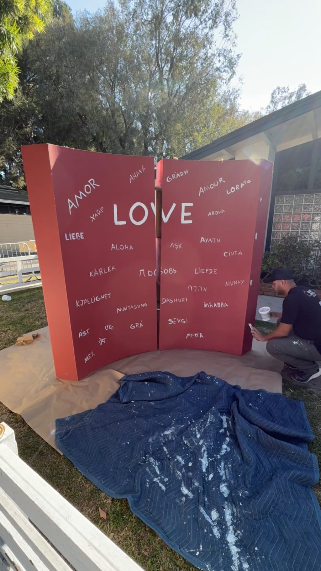 Eddie starting work on the red LOVE photo booth in Culver City, CA 90232
