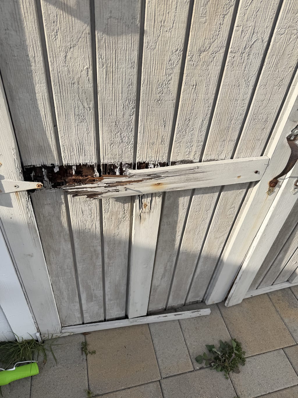Damaged, splitting exterior shed wood before repair in Hawthorne, CA 90250