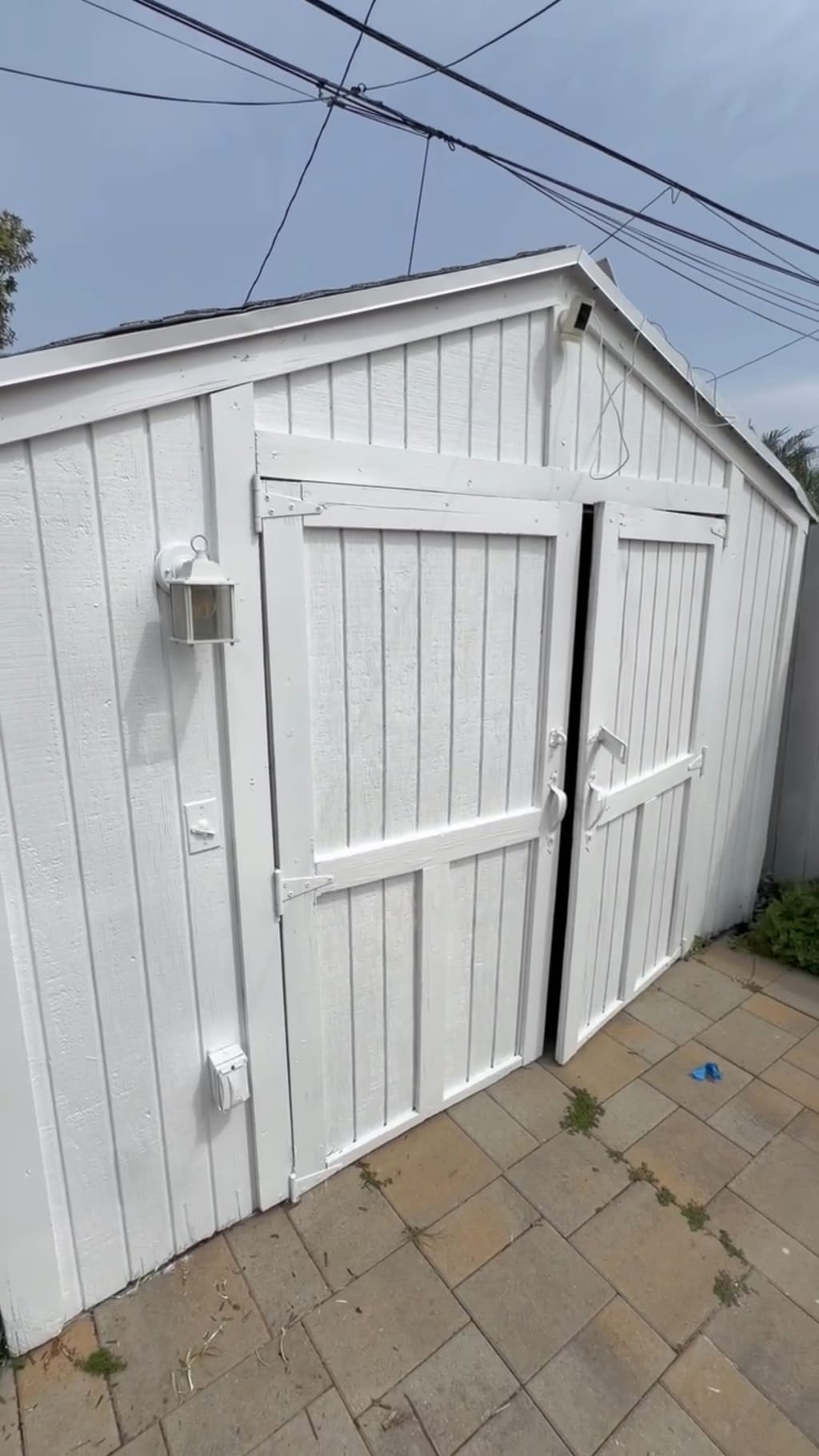 The whole shed repainted bright white with rebuilt doors in Hawthorne, CA 90250