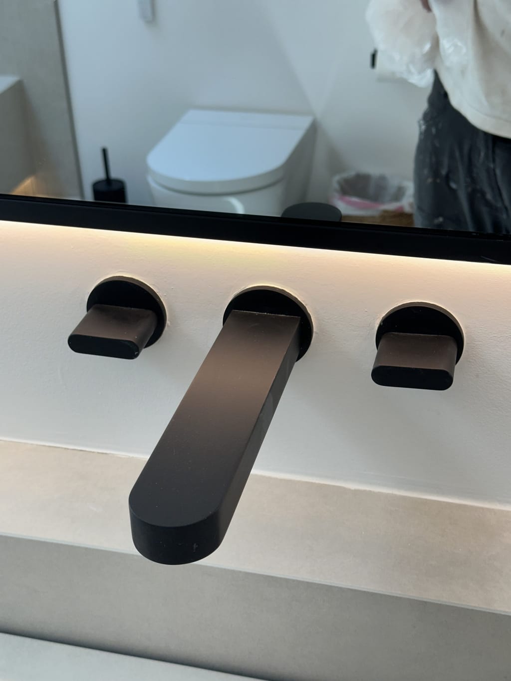 Detail of the corrected finish around the faucet handles in Malibu, CA 90265