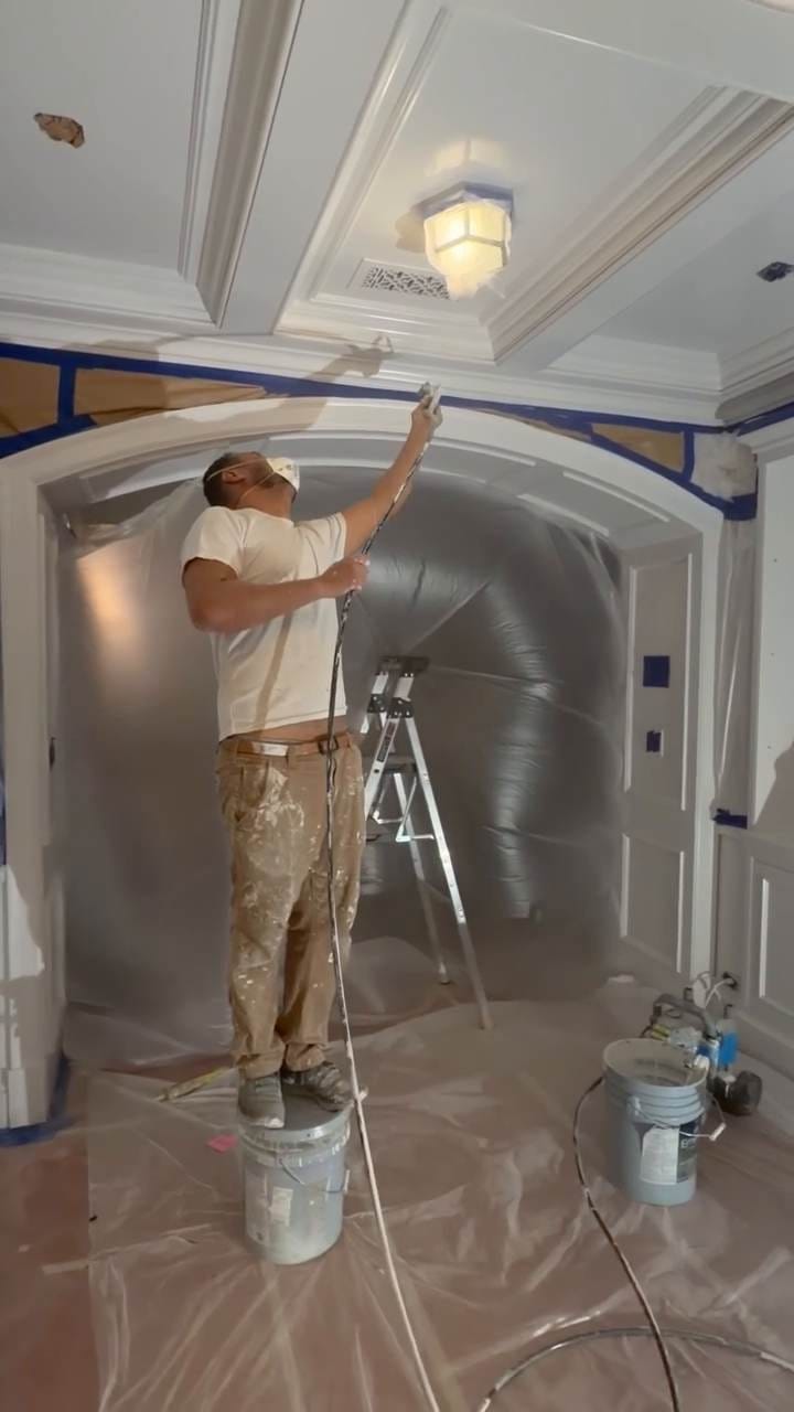 Painting ceiling and trim lines during a Pacific Palisades, CA 90272 renovation