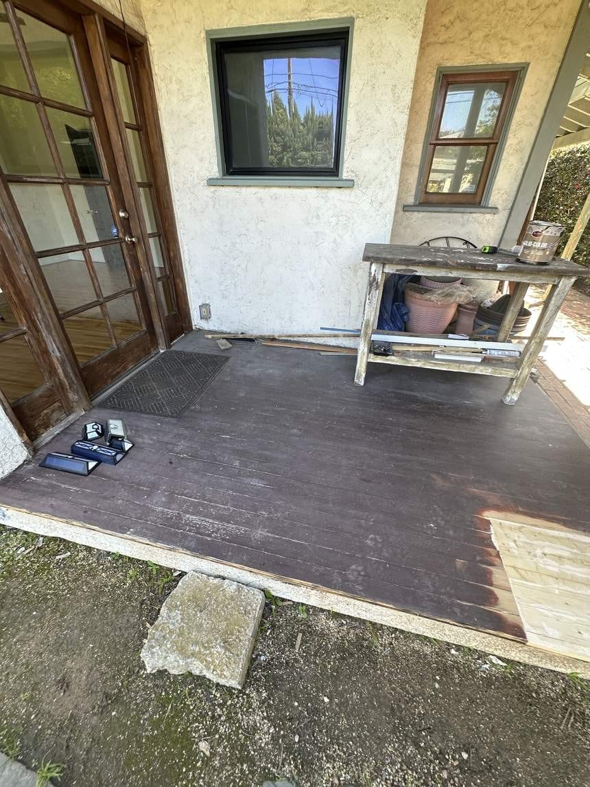 Tired deck area on a Venice, CA 90291 rental home before staining