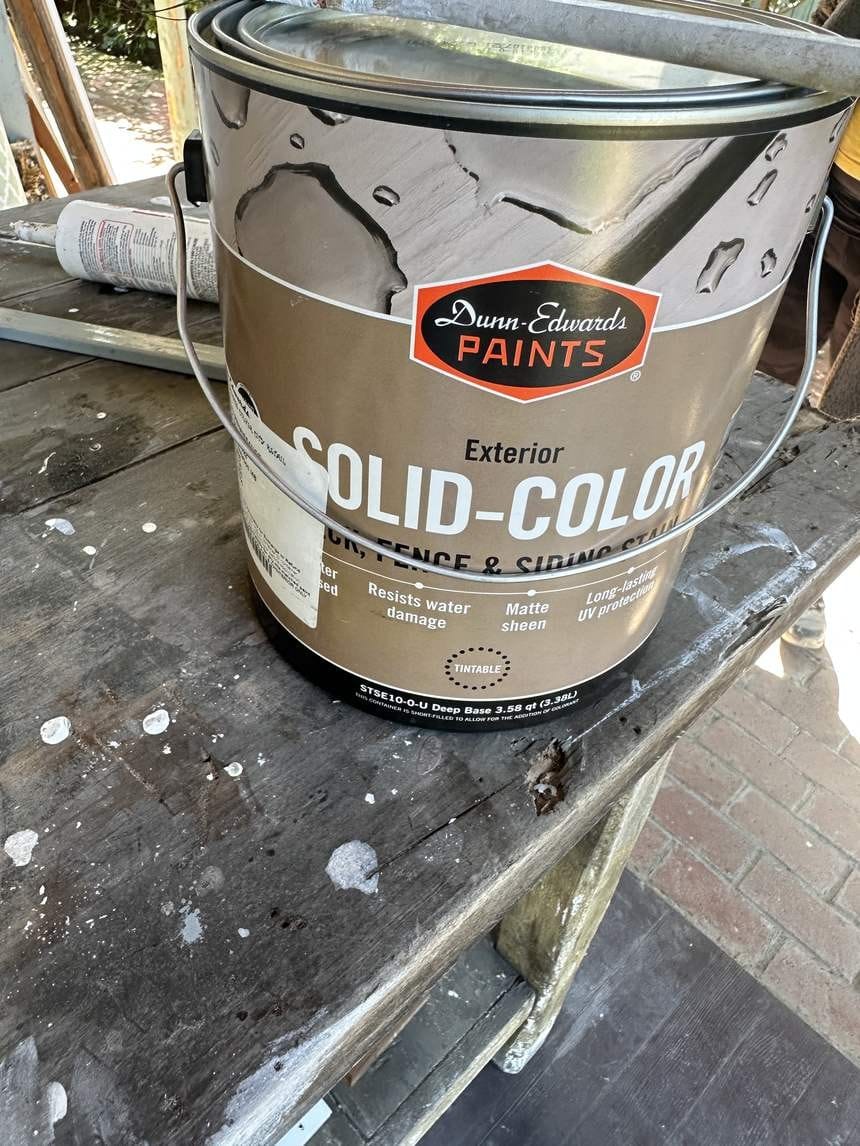Checking a solid-color deck stain sample in Venice, CA 90291