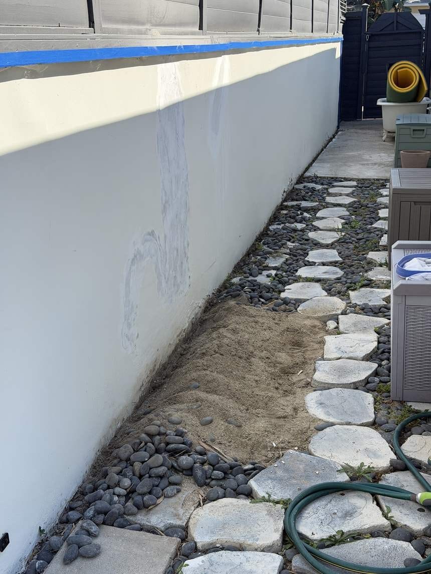 Exterior wall with minor damage and patch spots before painting in Playa del Rey, CA 90293