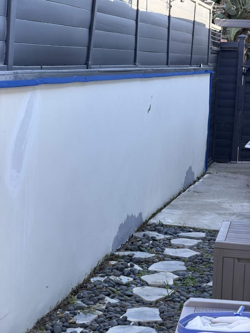 Finished exterior wall along a stone path in Playa del Rey, CA 90293