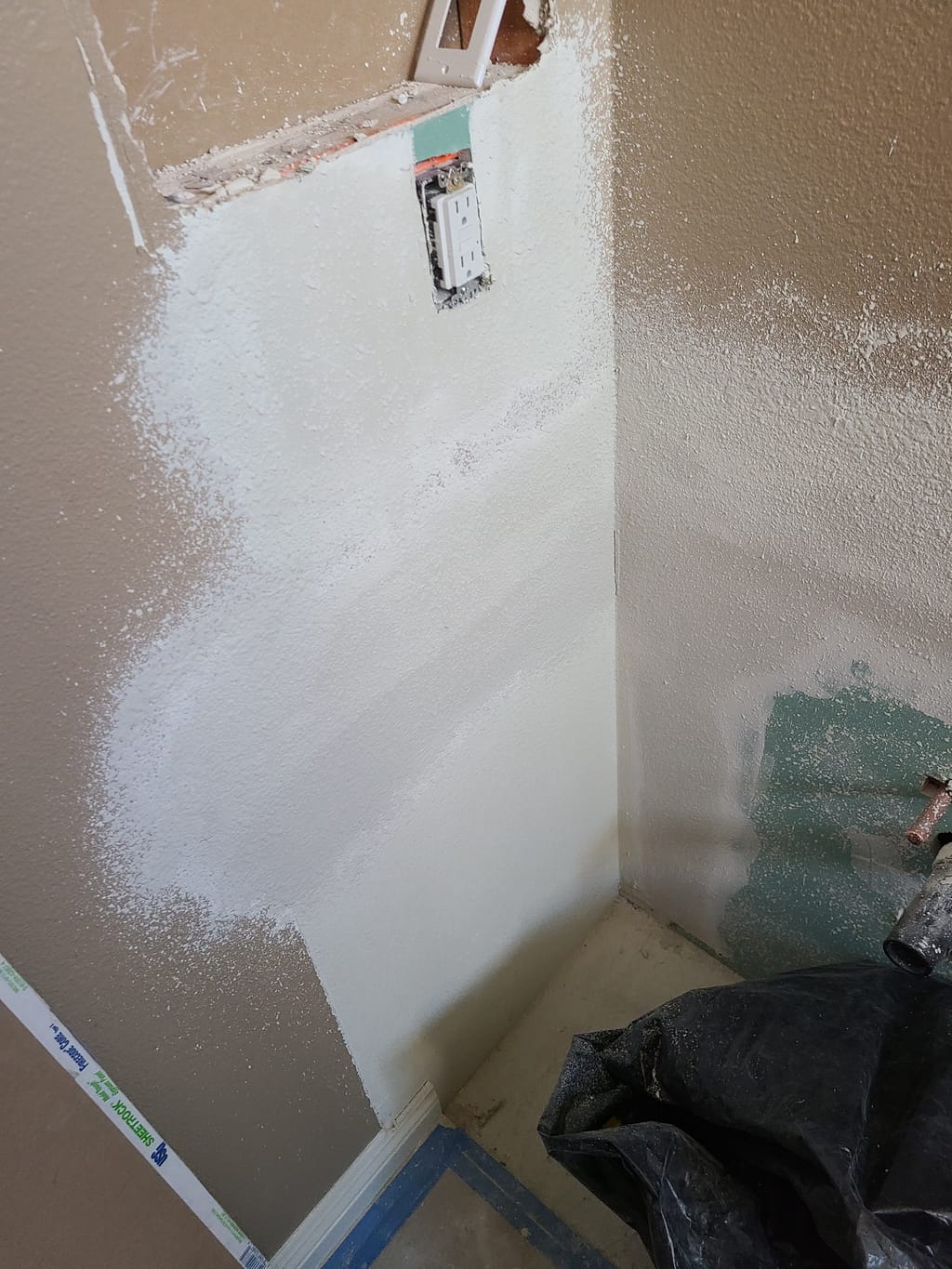 Bathroom drywall repair finished and texture-matched into the surrounding wall in Calabasas, CA 91302