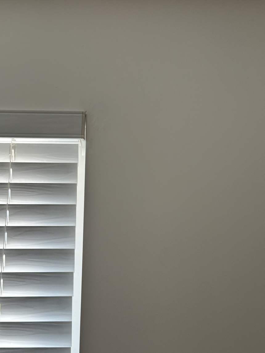 Clean corner by the blinds after patch and paint in Winnetka, CA 91306