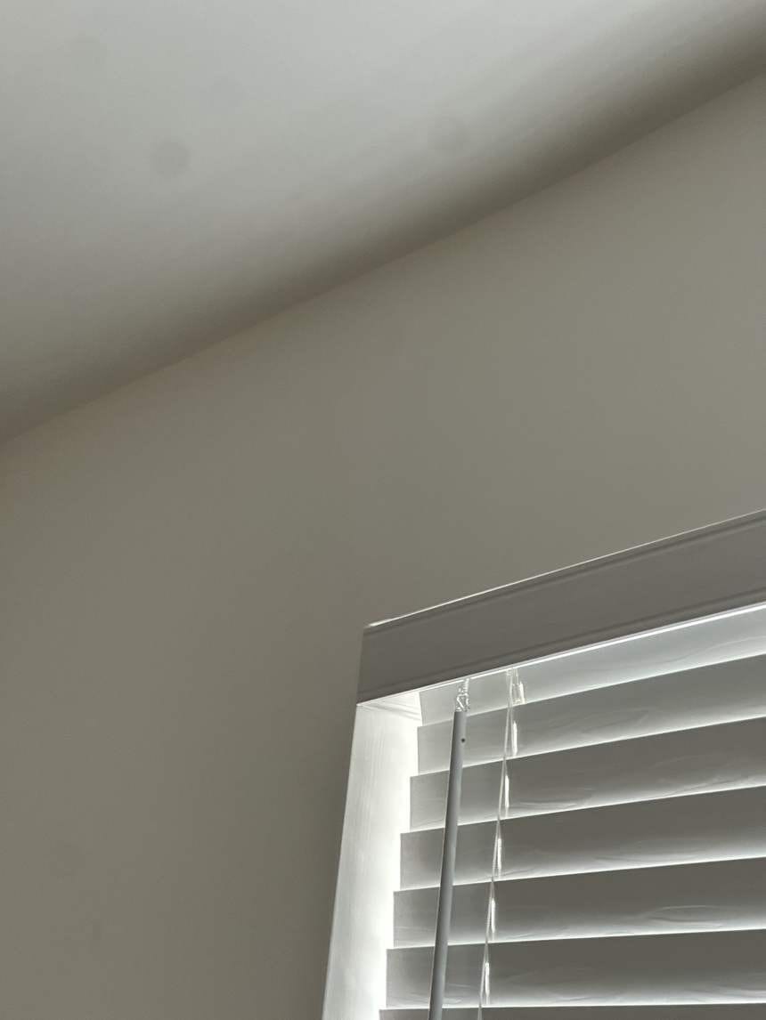 Clean ceiling-wall corner by the window after repair in Winnetka, CA 91306