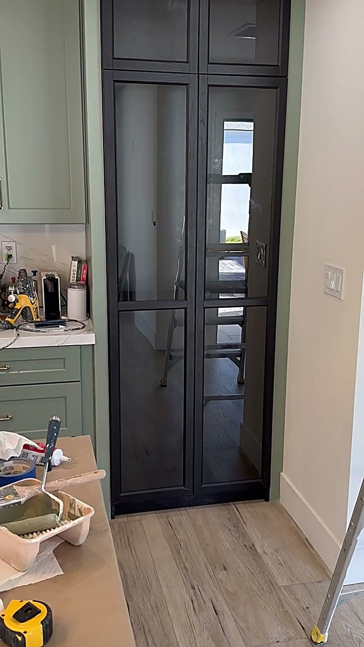 Black cabinet fitted cleanly into the former refrigerator opening in Burbank, CA 91506
