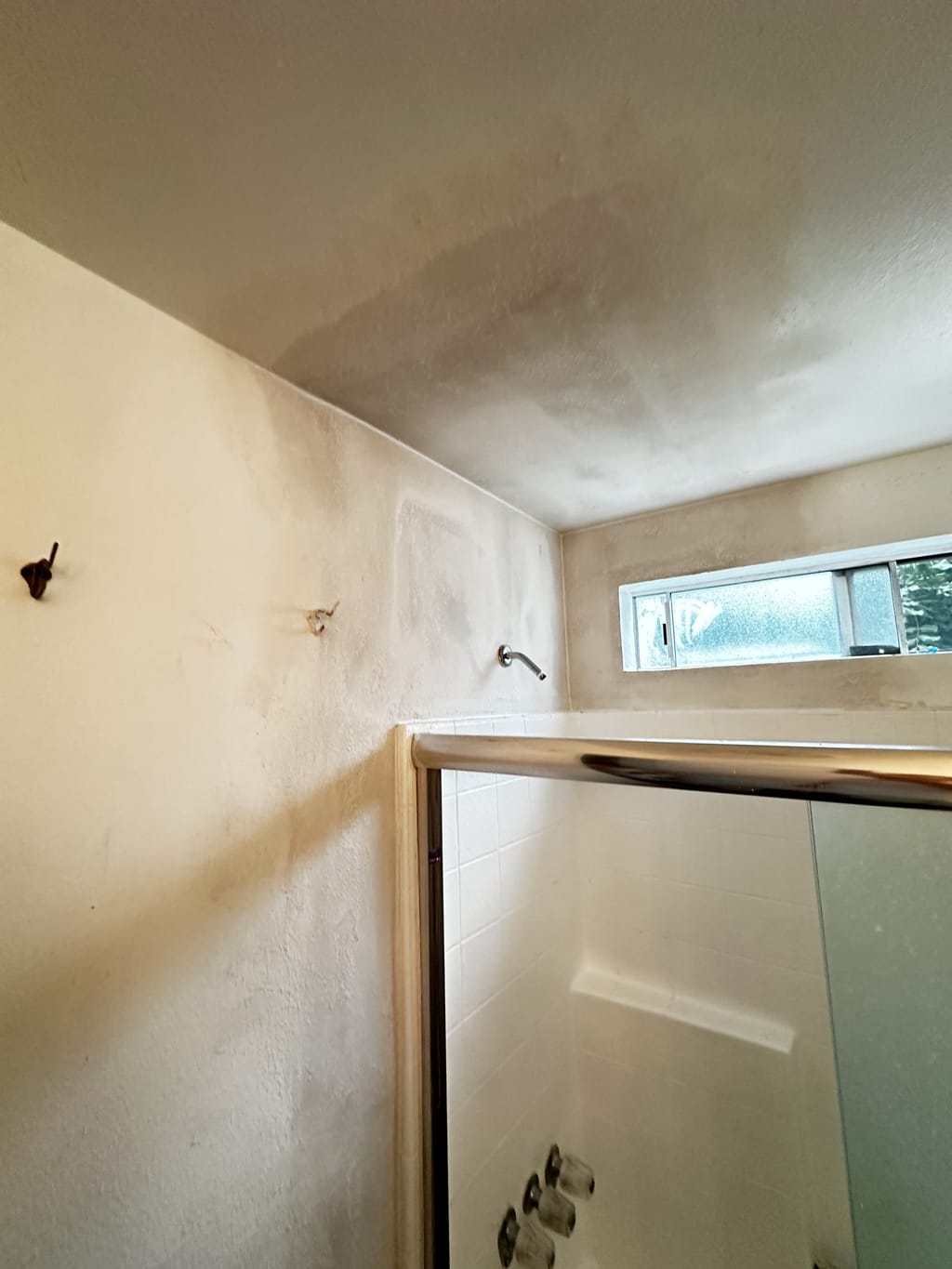 Drywall closed and mudded above the shower in North Hollywood, CA 91601