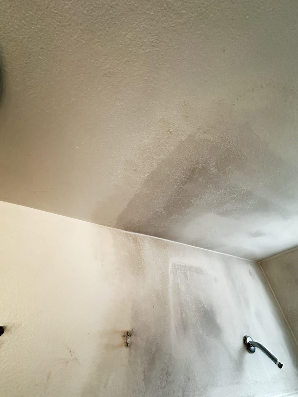 Bathroom ceiling-and-wall corner texture-matched above the shower in North Hollywood, CA 91601