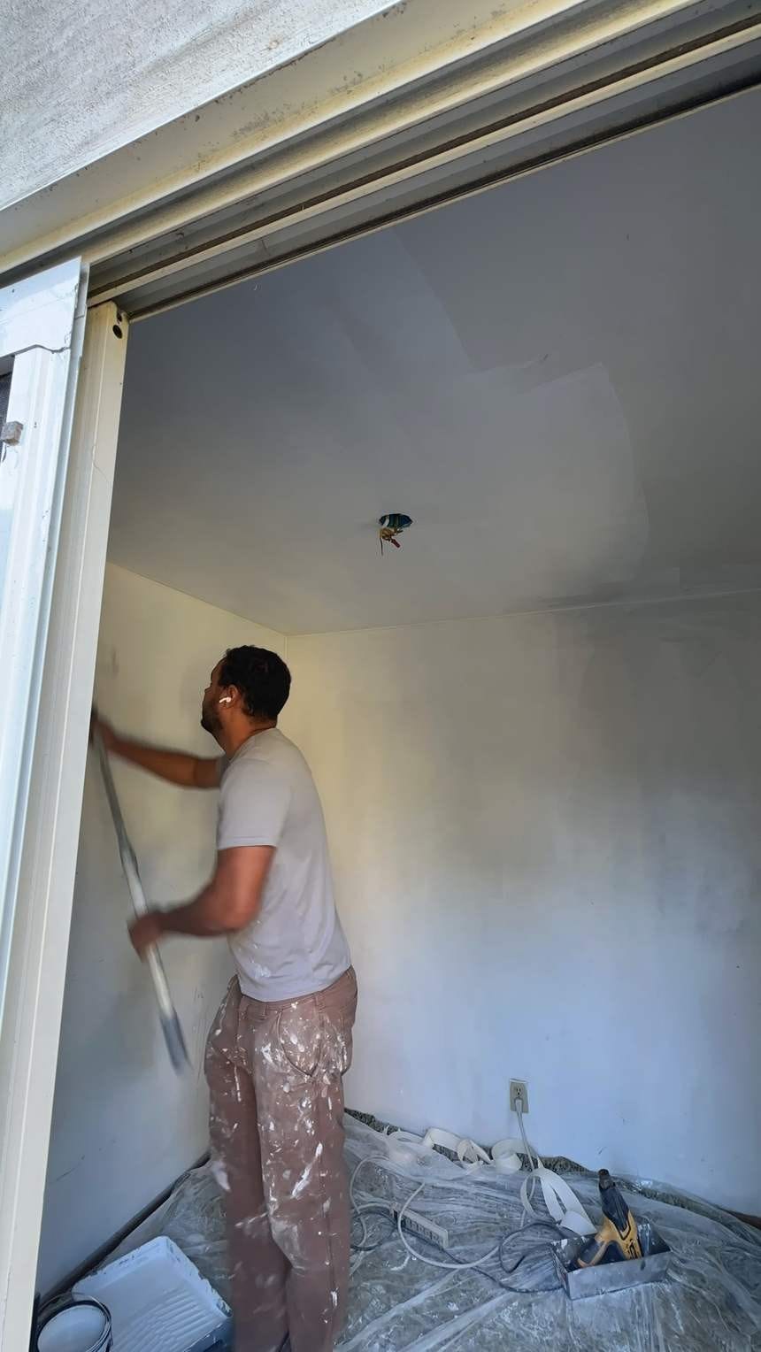 Prepping the wall for paint in North Hollywood, CA 91602