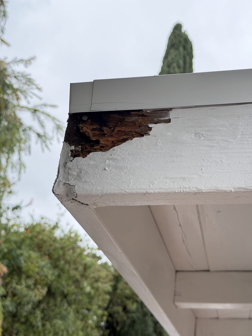 Damaged fascia wood at a patio corner needing repair in Irvine, CA 92618