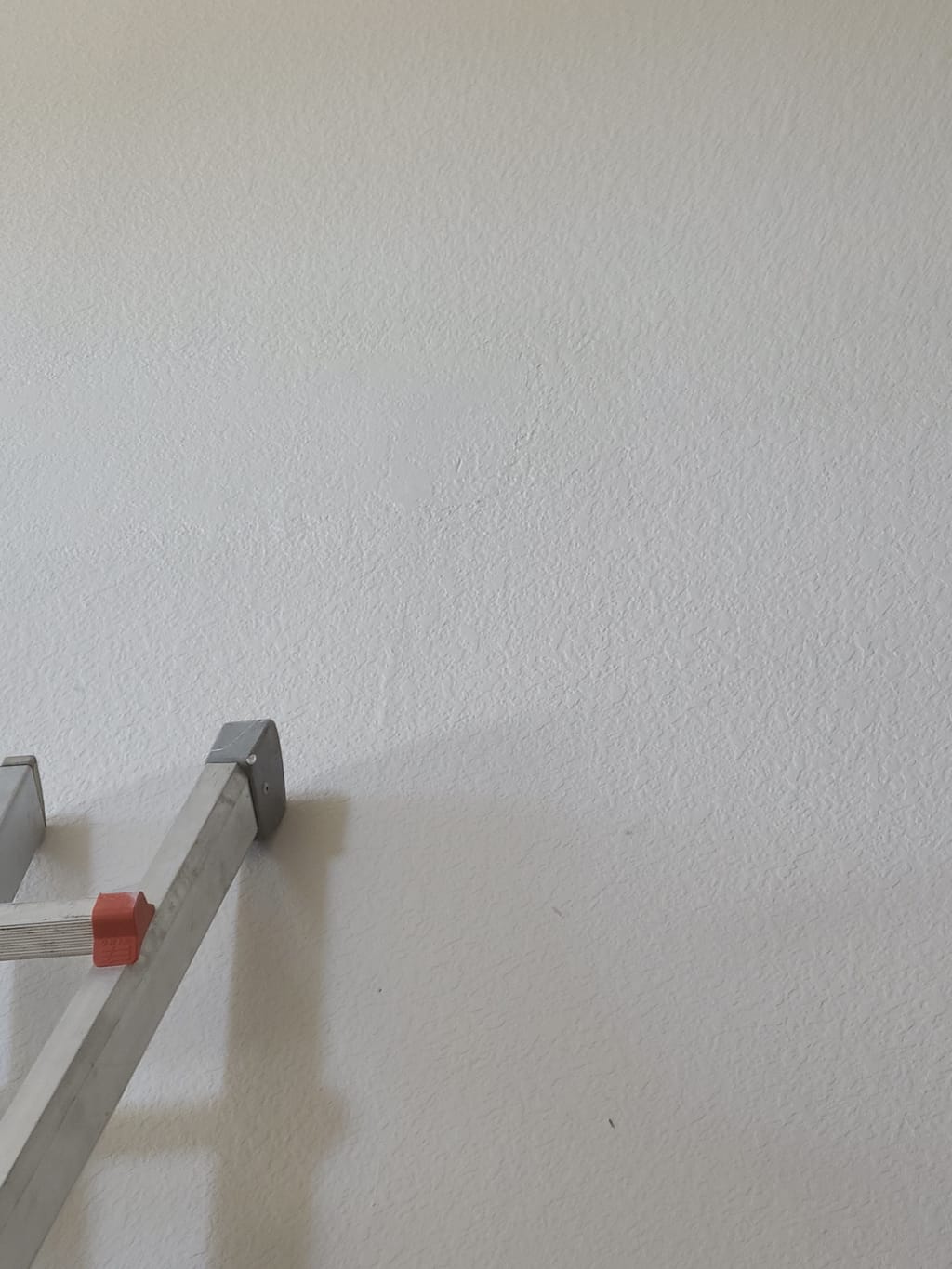 First drywall patch blended into the knockdown texture in Corona, CA 92882