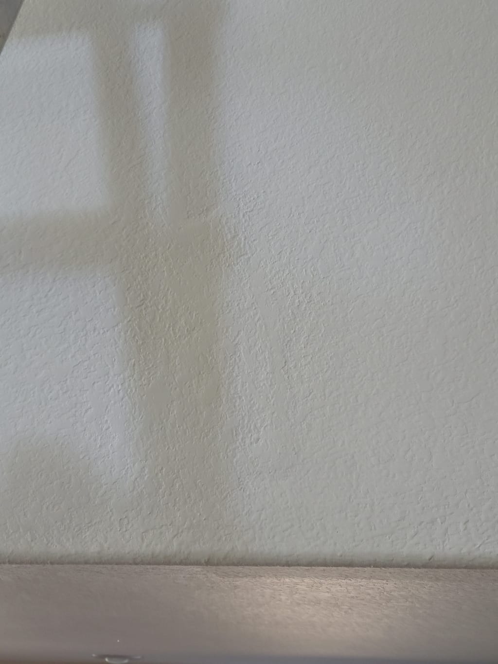 Second drywall repair finished, textured and painted near the ceiling in Corona, CA 92882