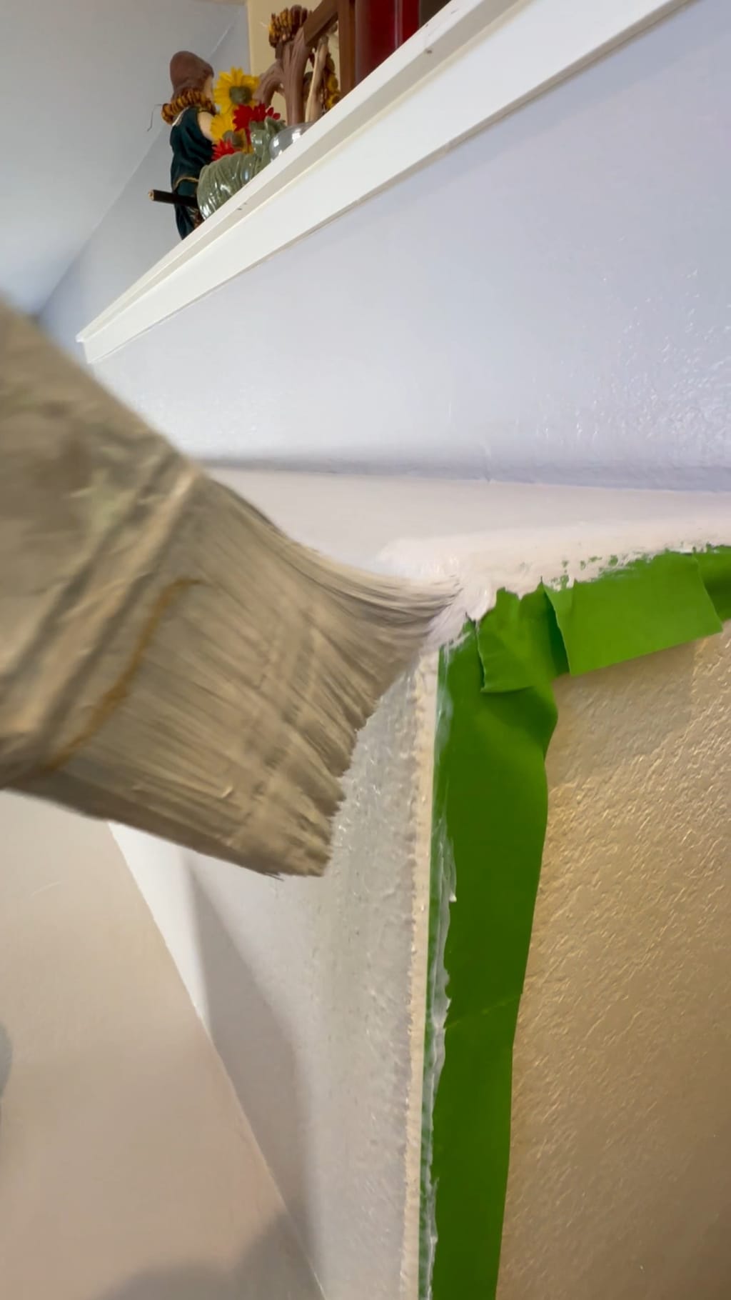 Brush cutting in white paint along the taped two-tone edge in Camarillo, CA 93010